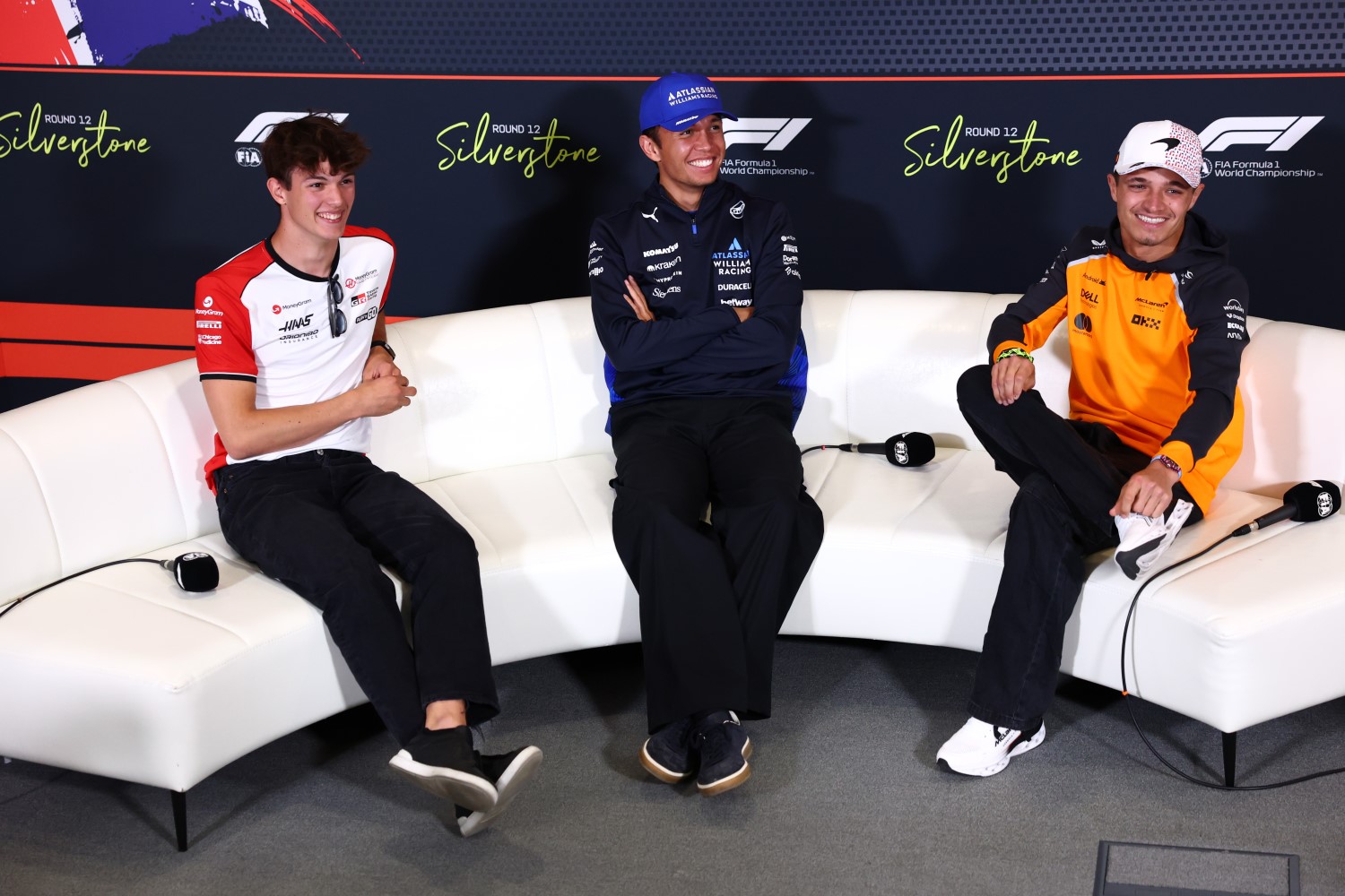 Oliver Bearman of Great Britain and Haas F1 Alexander Albon of Thailand and Williams and Lando Norris of Great Britain and McLaren in the Drivers Press Conference during previews ahead of the F1 Grand Prix of Great Britain at Silverstone Circuit on July 03, 2025 in Northampton, England. (Photo by Clive Rose/Getty Images for Haas F1)