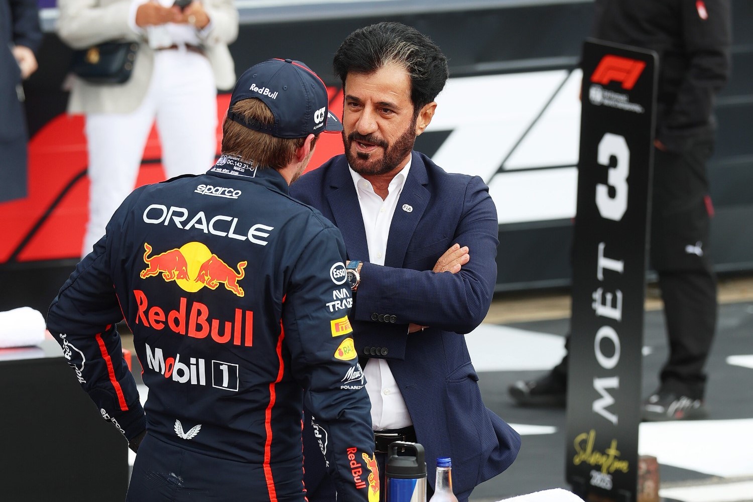 Pole position qualifier Max Verstappen of the Netherlands and Oracle Red Bull Racing and Mohammed ben Sulayem, FIA President talk in parc ferme during qualifying ahead of the F1 Grand Prix of Great Britain at Silverstone Circuit on July 05, 2025 in Northampton, England. (Photo by Steven Tee/LAT Images) // Getty Images / Red Bull Content Pool //