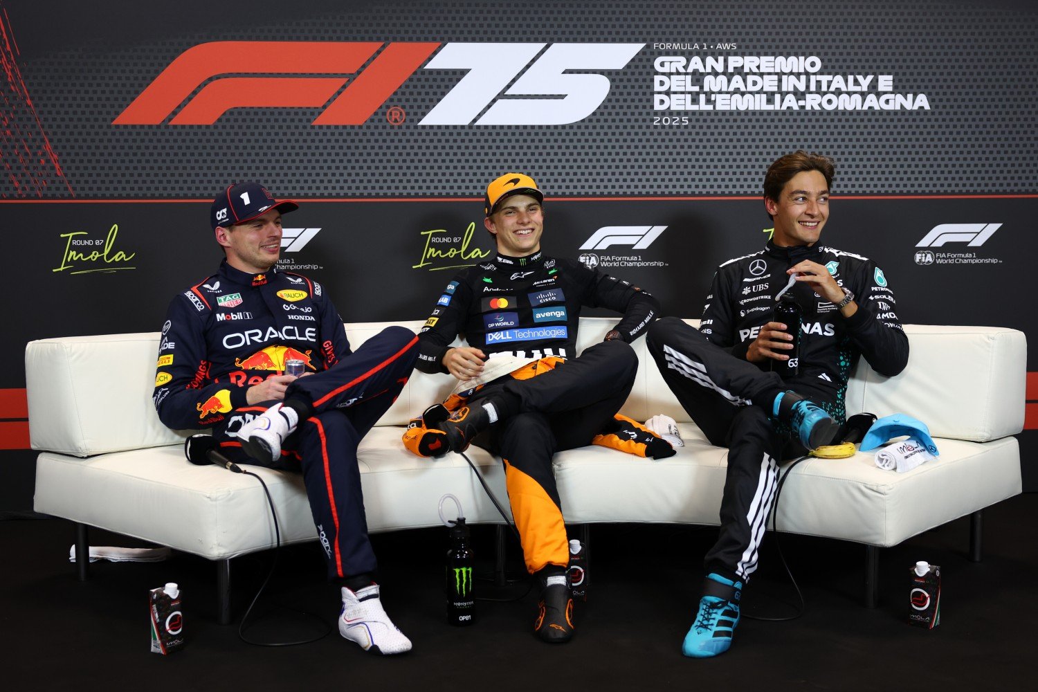 Pole position qualifier Oscar Piastri of Australia and McLaren Second placed qualifier Max Verstappen of the Netherlands and Oracle Red Bull Racing and Third placed qualifier George Russell of Great Britain and Mercedes AMG Petronas F1 Team in the Drivers Press Conference during qualifying ahead of the F1 GP of Emilia-Romagna at Autodromo Internazionale Enzo e Dino Ferrari on May 17, 2025 in Imola, Italy. (Photo by Clive Rose/Getty Images) // Getty Images / Red Bull Content Pool //
