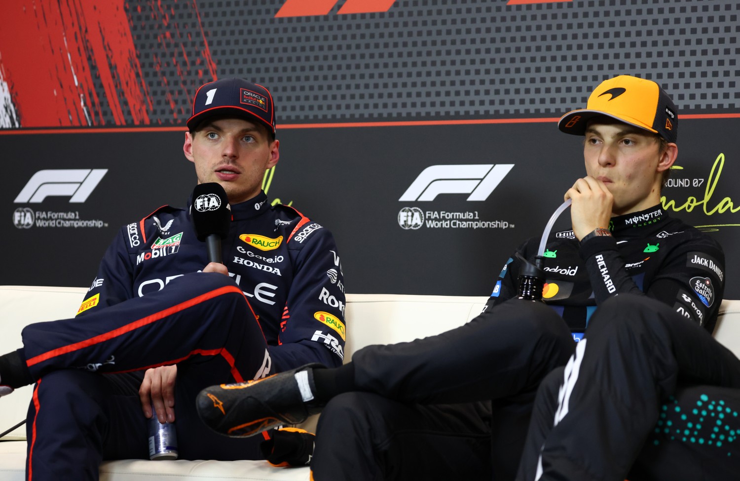 Second placed qualifier Max Verstappen of the Netherlands and Oracle Red Bull Racing and Pole position qualifier Oscar Piastri of Australia and McLaren in the Drivers Press Conference during qualifying ahead of the F1 GP of Emilia-Romagna at Autodromo Internazionale Enzo e Dino Ferrari on May 17, 2025 in Imola, Italy. (Photo by Clive Rose/Getty Images) // Getty Images / Red Bull Content Pool //