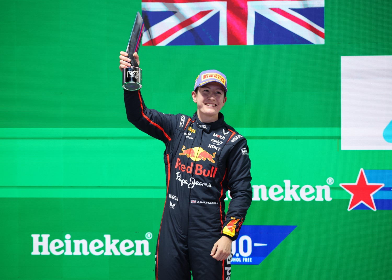 Second placed Alisha Palmowski of Great Britain and Campos Racing (21) on the podium during F1 Academy Round 7, race 2 at Las Vegas Strip Circuit on November 22, 2025 in Las Vegas, Nevada. (Photo by Hector Vivas/Getty Images) // Getty Images //