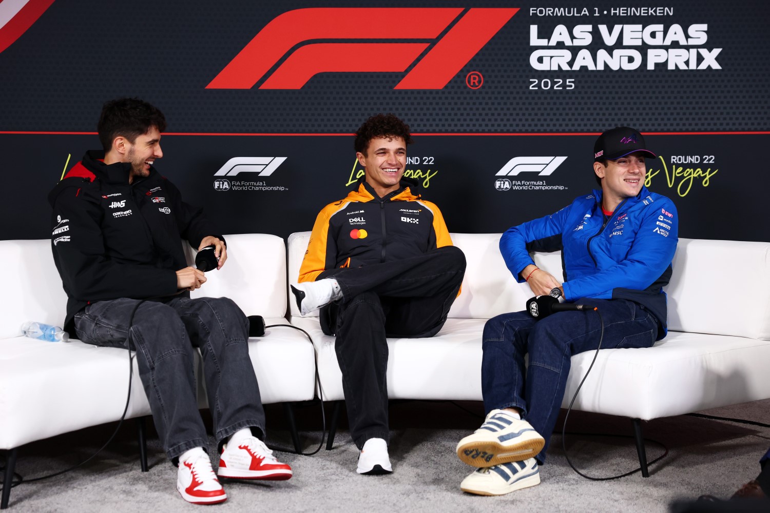 Esteban Ocon of France and Haas F1, Lando Norris of Great Britain and McLaren and Franco Colapinto of Argentina and Alpine F1 attend the Drivers Press Conference during previews ahead of the F1 Grand Prix of Las Vegas at Las Vegas Strip Circuit on November 19, 2025 in Las Vegas, Nevada. (Photo by Clive Rose/Getty Images for Haas)