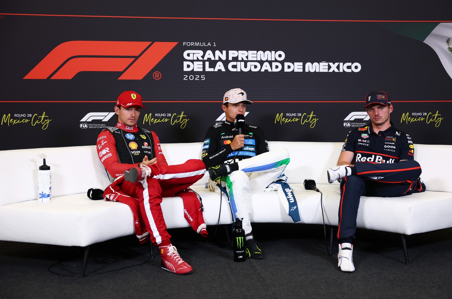 Race winner Lando Norris of Great Britain and McLaren Second placed Charles Leclerc of Monaco and Scuderia Ferrari and Third placed Max Verstappen of the Netherlands and Oracle Red Bull Racing in the Drivers Press Conference during the F1 Grand Prix of Mexico at Autodromo Hermanos Rodriguez on October 26, 2025 in Mexico City, Mexico. (Photo by Clive Rose/Getty Images) // Getty Images / Red Bull Content Pool //