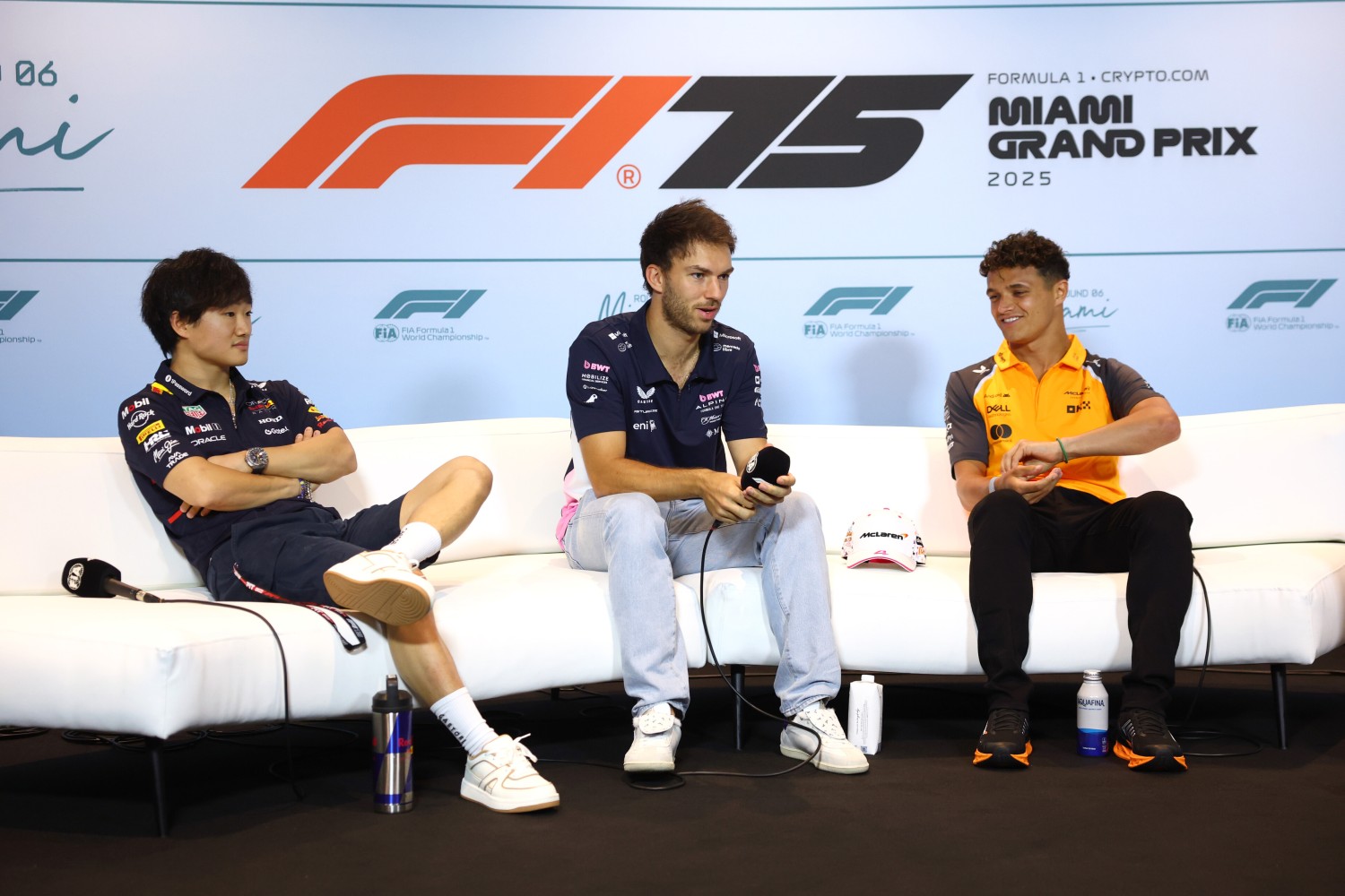 Yuki Tsunoda of Japan and Oracle Red Bull Racing, Pierre Gasly of France and Alpine F1 and Lando Norris of Great Britain and McLaren attend the Drivers Press Conference during previews ahead of the F1 Grand Prix of Miami at Miami International Autodrome on May 01, 2025 in Miami, Florida. (Photo by Clive Rose/Getty Images) // Getty Images / Red Bull Content Pool //