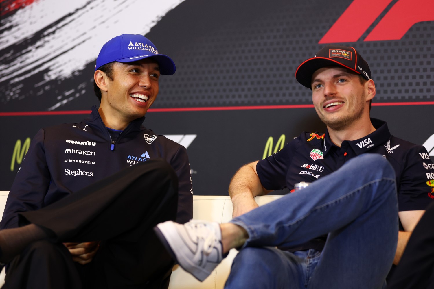 Alexander Albon of Thailand and Williams and Max Verstappen of the Netherlands and Oracle Red Bull Racing talk in the Drivers Press Conference during previews ahead of the F1 GP of Monaco at Circuit de Monaco on May 22, 2025 in Monte-Carlo, Monaco. (Photo by Clive Rose/Getty Images) // Getty Images / Red Bull Content Pool //