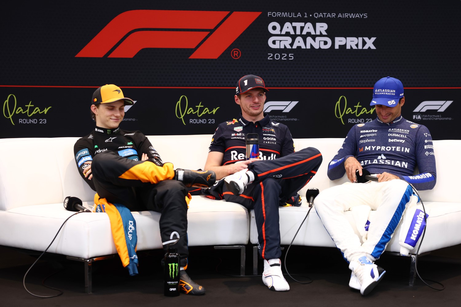 Race winner Max Verstappen of the Netherlands and Oracle Red Bull Racing Second placed Oscar Piastri of Australia and McLaren and Third placed Carlos Sainz of Spain and Williams in the Drivers Press Conference during the F1 Grand Prix of Qatar at Lusail International Circuit on November 30, 2025 in Lusail City, Qatar. (Photo by Clive Rose/Getty Images) // Getty Images / Red Bull Content Pool //