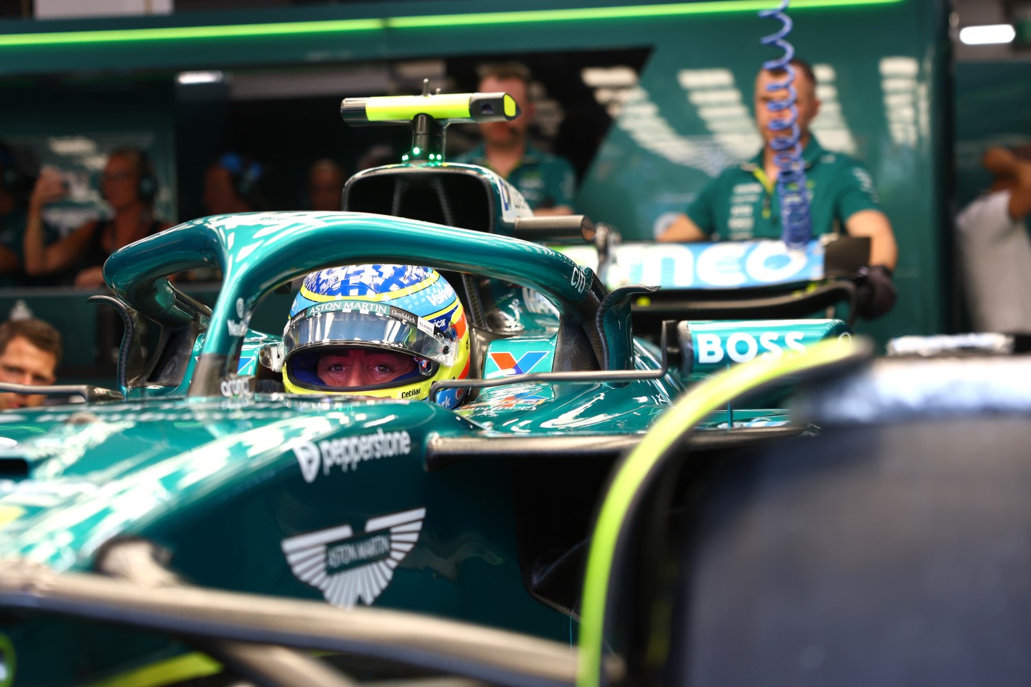 Fernando Alonso of Spain and Aston Martin F1 Team prepares to drive prior to practice ahead of the F1 Grand Prix of Singapore at Marina Bay Street Circuit on October 03, 2025 in Singapore, Singapore. (Photo by Zak Mauger/LAT Images for Aston Martin)