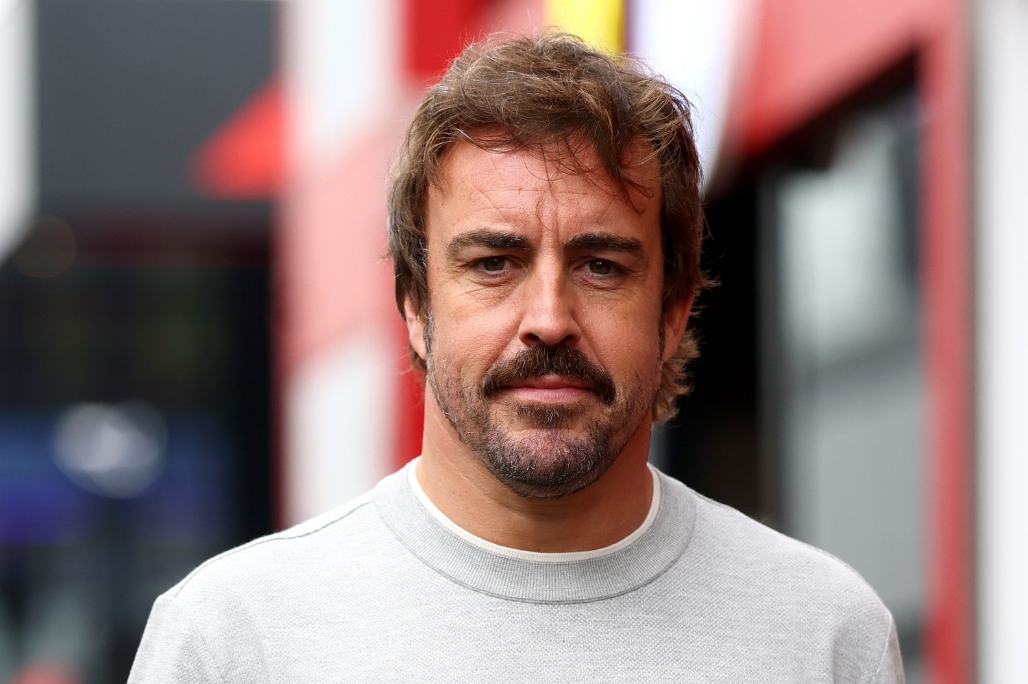 Fernando Alonso of Spain and Aston Martin F1 Team arrives in the Paddock during previews ahead of the F1 Grand Prix of Belgium at Circuit de Spa-Francorchamps on July 24, 2025 in Spa, Belgium. (Photo by Zak Mauger/LAT Images for Aston Martin)