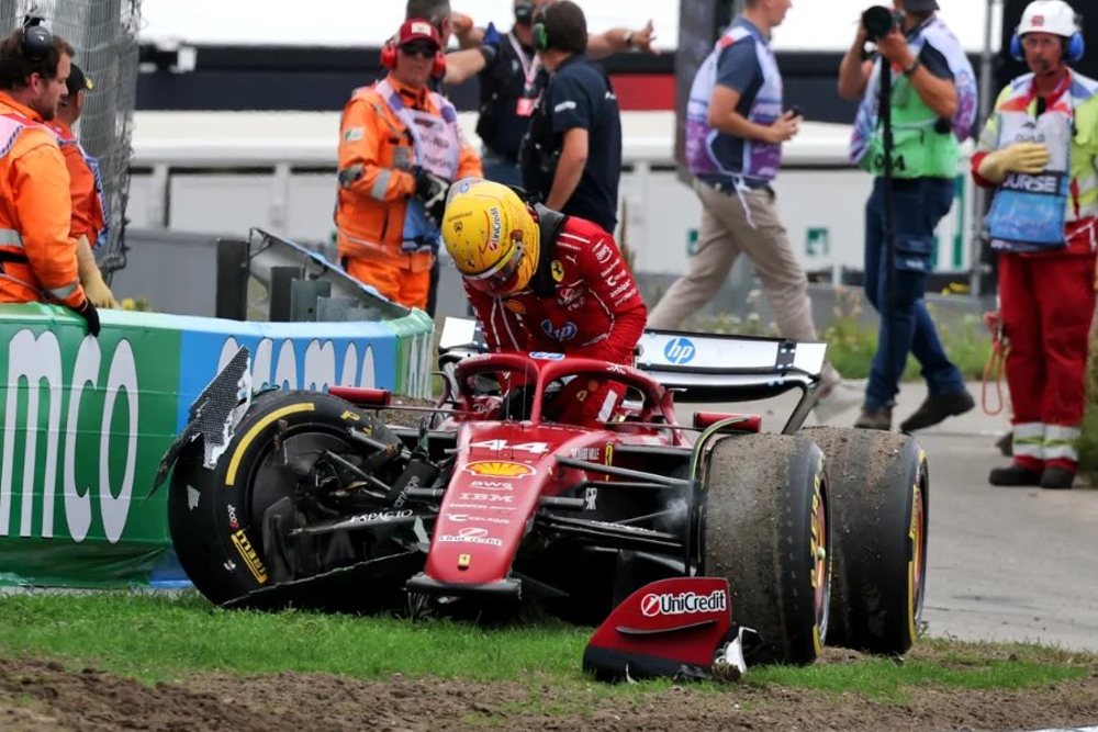 #44 Lewis Hamilton climbs out of his wadded up Ferrari after crashing out on lap 23