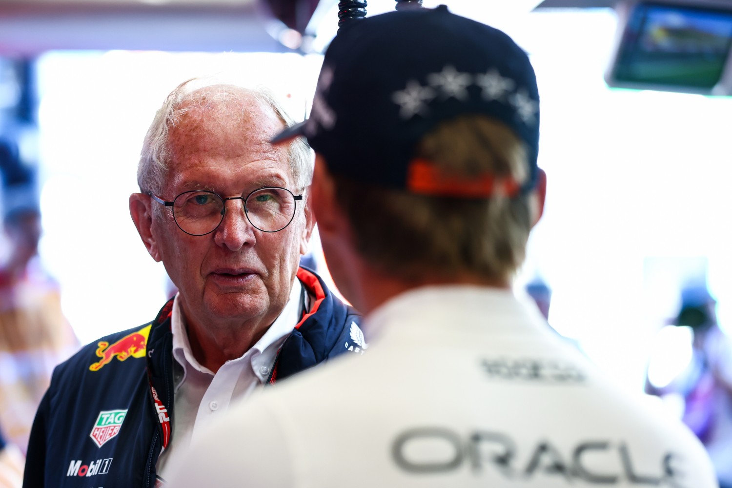 Dr Helmut Marko, Team Consultant of Oracle Red Bull Racing talks with Max Verstappen of the Netherlands and Oracle Red Bull Racing in the garage during final practice ahead of the F1 Grand Prix of Netherlands at Circuit Zandvoort on August 30, 2025 in Zandvoort, Netherlands. (Photo by Mark Thompson/Getty Images) // Getty Images / Red Bull Content Pool //