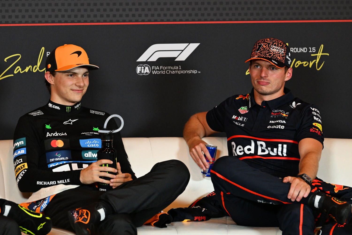 Pole position qualifier Oscar Piastri of Australia and McLaren and Third placed qualifier Max Verstappen of the Netherlands and Oracle Red Bull Racing in the Drivers Press Conference during qualifying ahead of the F1 Dutch GP at Circuit Zandvoort on August 30, 2025 in Zandvoort, Netherlands. (Photo by Mark Sutton/Getty Images) // Getty Images / Red Bull Content Pool //
