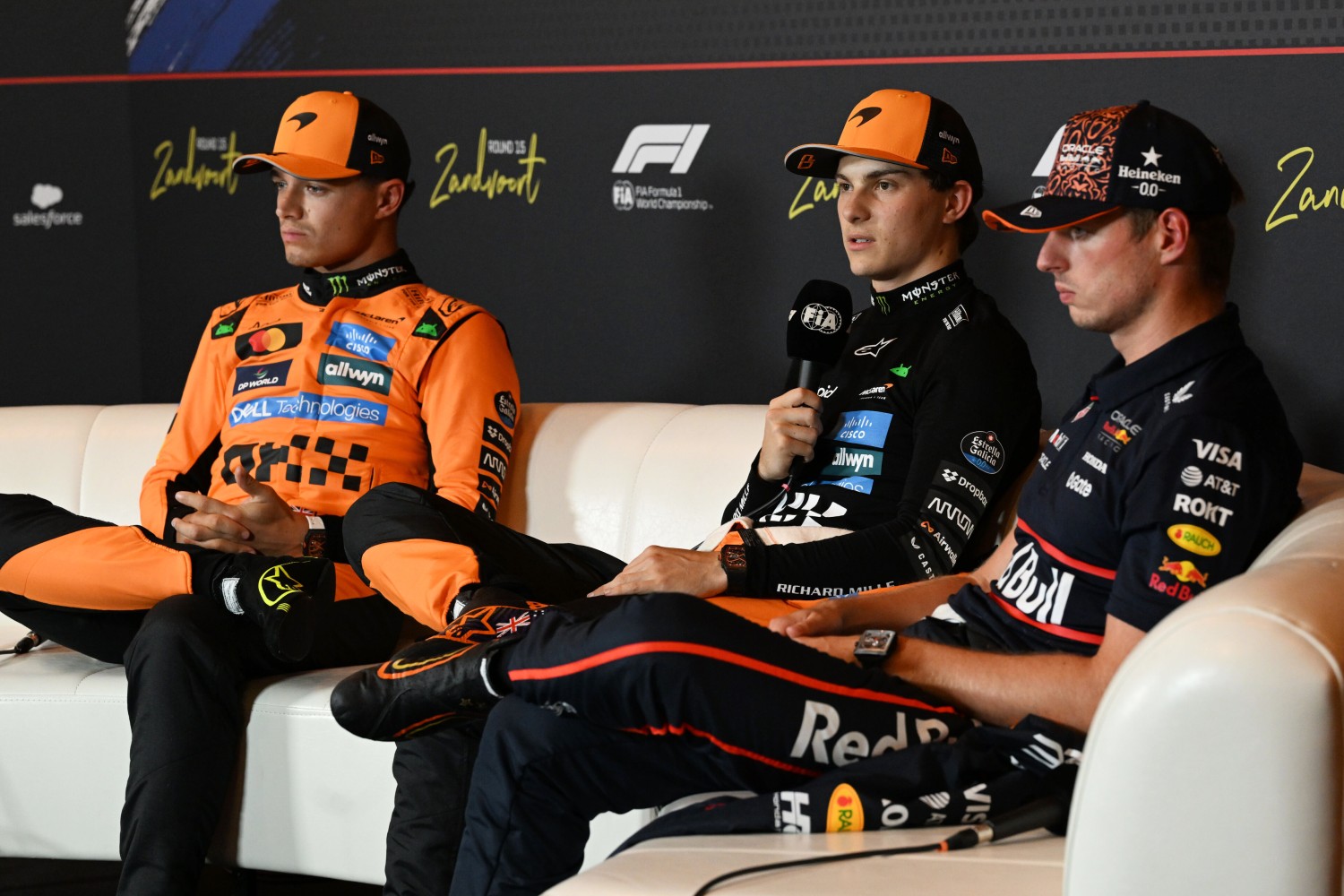 Pole position qualifier Oscar Piastri of Australia and McLaren Second placed qualifier Lando Norris of Great Britain and McLaren and Third placed qualifier Max Verstappen of the Netherlands and Oracle Red Bull Racing in the Drivers Press Conference during qualifying ahead of the F1 Dutch GP at Circuit Zandvoort on August 30, 2025 in Zandvoort, Netherlands. (Photo by Mark Sutton/Getty Images) // Getty Images / Red Bull Content Pool //