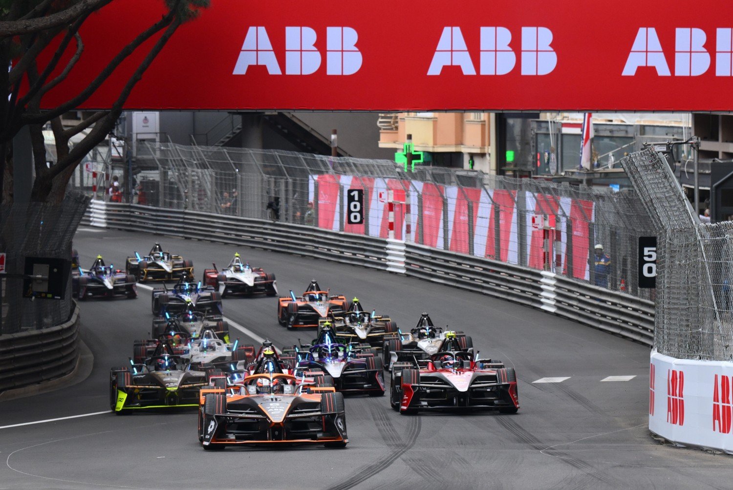Taylor Barnard of Great Britain driving the (5) NEOM McLaren Formula E Team Nissan e-4ORCE 05 leads the field into turn one at the start during the Monaco E-Prix, Round 6 of the 2025 FIA Formula E World Championship at Circuit de Monaco on May 03, 2025 in Monte-Carlo, Monaco. (Photo by Simon Galloway/LAT Images for Formula E)