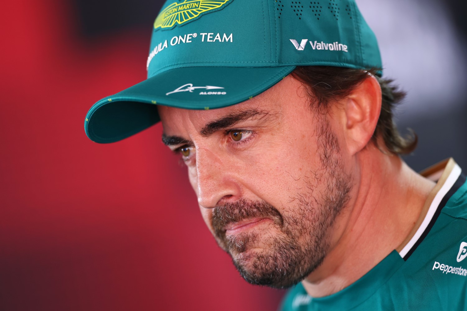 Fernando Alonso of Spain and Aston Martin F1 Team looks on during previews ahead of the F1 Grand Prix of Emilia-Romagna at Autodromo Internazionale Enzo e Dino Ferrari on May 15, 2025 in Imola, Italy. (Photo by Clive Rose/Getty Images for Aston Martin)