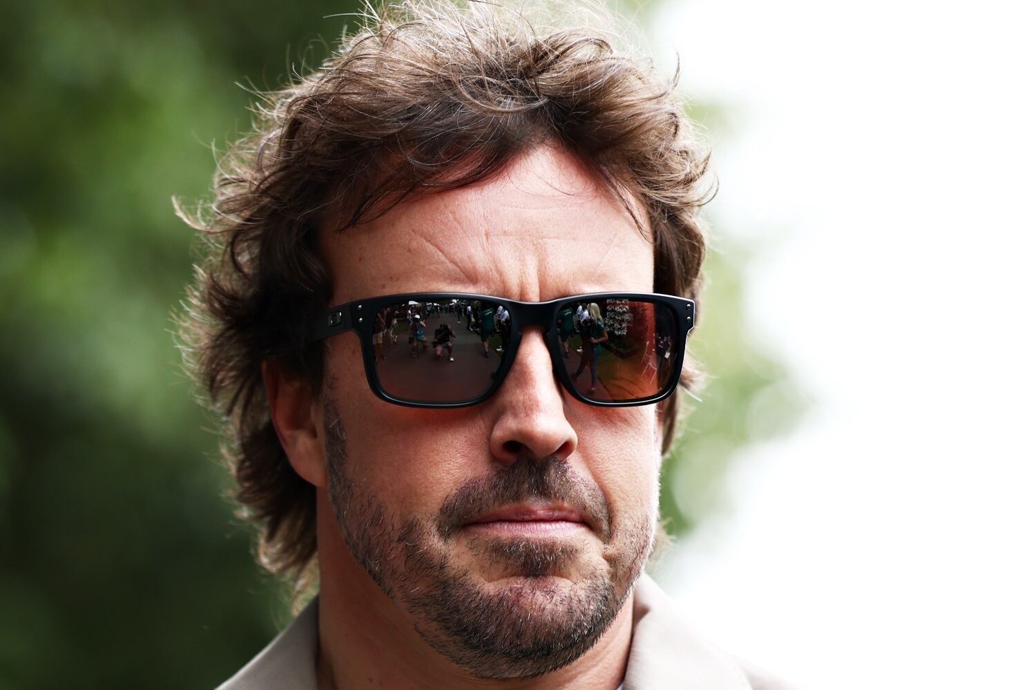 Fernando Alonso of Spain and Aston Martin F1 Team looks on in the Paddock during previews ahead of the F1 Grand Prix of Australia at Albert Park Grand Prix Circuit on March 13, 2025 in Melbourne, Australia. (Photo by Zak Mauger/LAT Images for Aston Martin)