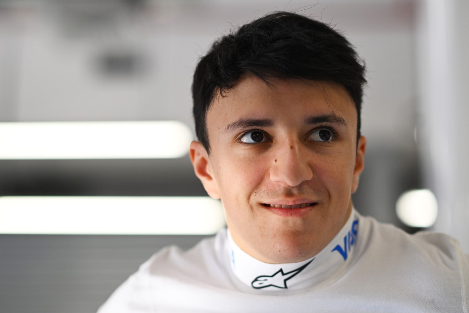 Isack Hadjar of France and Visa Cash App Racing Bulls looks on in the Paddock during previews ahead of the F1 Grand Prix of Qatar at Lusail International Circuit on November 27, 2025 in Lusail City, Qatar. (Photo by Rudy Carezzevoli/Getty Images) // Getty Images / Red Bull Content Pool //