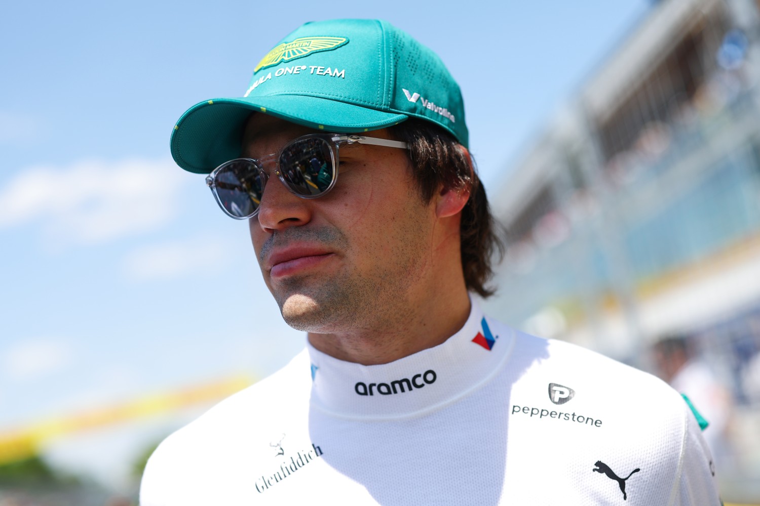 Lance Stroll of Canada and Aston Martin F1 Team prepares to drive on the grid prior to the F1 Grand Prix of Canada at Circuit Gilles-Villeneuve on June 15, 2025 in Montreal, Quebec. (Photo by Zak Mauger/LAT Images for Aston Martin)