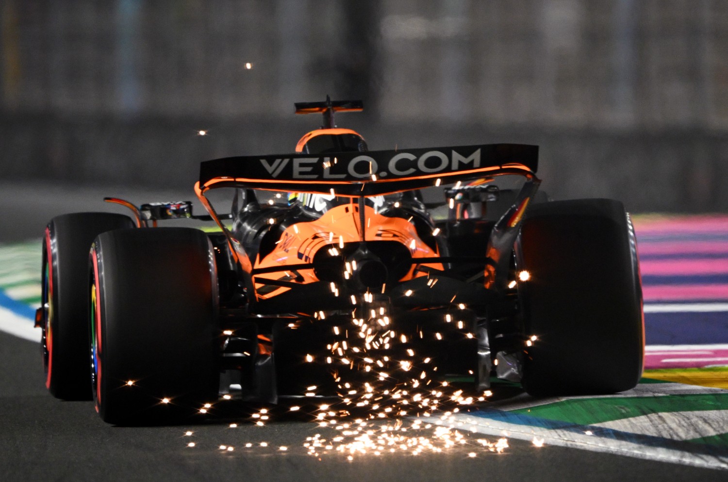 Sparks fly behind Oscar Piastri of Australia driving the (81) McLaren MCL39 Mercedes on track during qualifying ahead of the F1 Grand Prix of Saudi Arabia at Jeddah Corniche Circuit on April 19, 2025 in Jeddah, Saudi Arabia. (Photo by Clive Mason/Getty Images)
