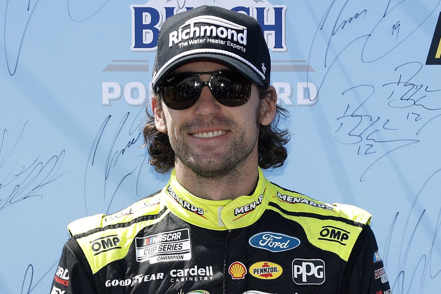 Ryan Blaney, driver of the #12 Menards/Richmond Water Heaters Ford, poses for photos after winning the pole award during qualifying for the NASCAR Cup Series Go Bowling at The Glen at Watkins Glen International on August 09, 2025 in Watkins Glen, New York. (Photo by Sean Gardner/Getty Images)