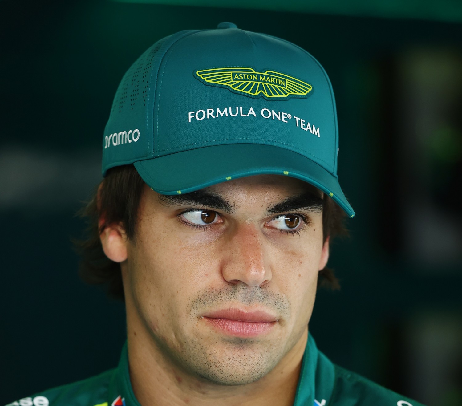Lance Stroll of Canada and Aston Martin F1 Team looks on in the garage during previews ahead of the F1 Grand Prix of Canada at Circuit Gilles-Villeneuve on June 12, 2025 in Montreal, Quebec. (Photo by Zak Mauger/LAT Images for Aston Martin)