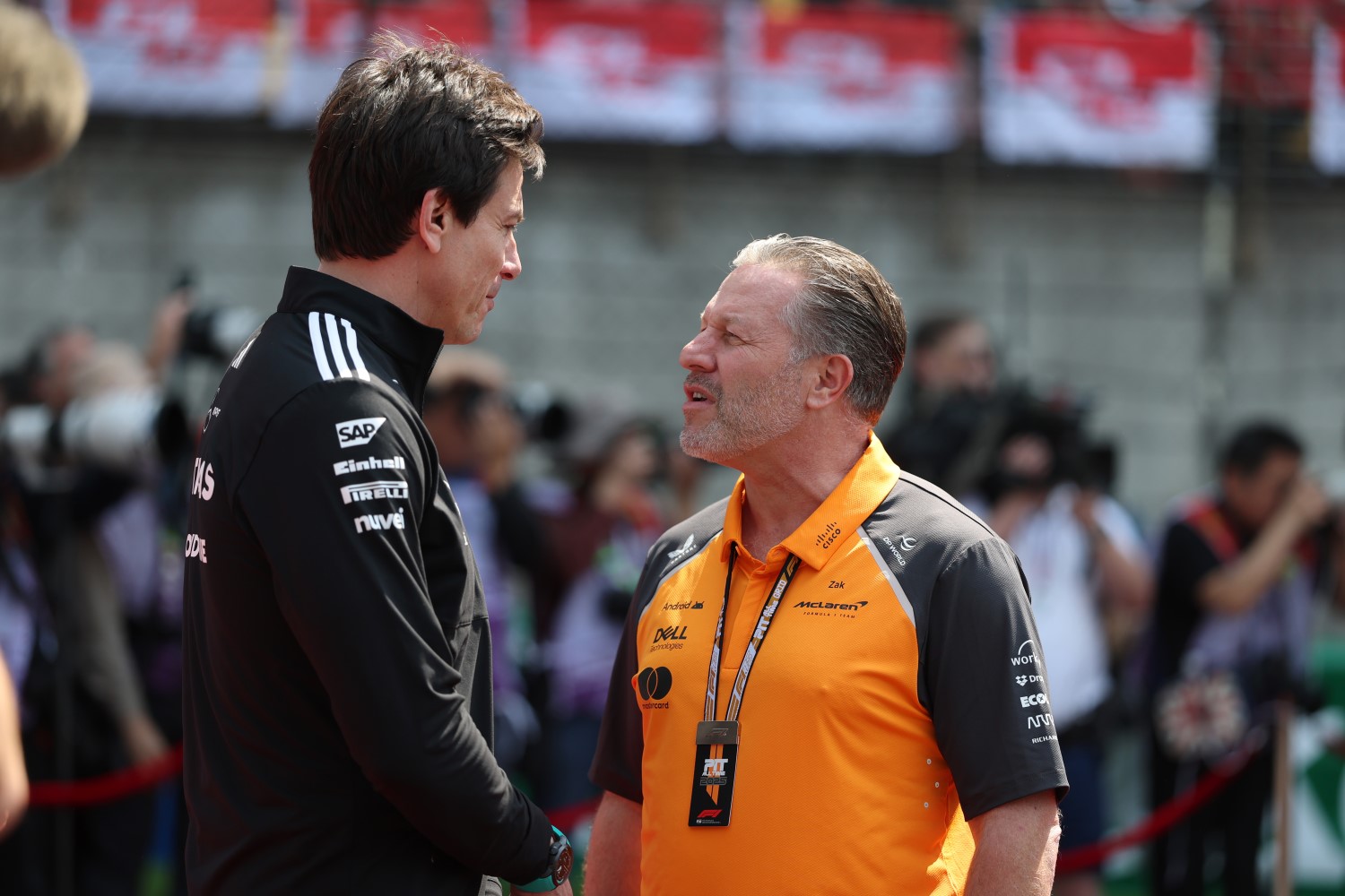 Toto Wolff, Executive Director of Mercedes AMG Petronas F1 Team and Zak Brown, Chief Executive Officer of McLaren talk in the Paddock prior to the F1 Grand Prix of China at Shanghai International Circuit on March 23, 2025 in Shanghai, China. (Photo by Mark Thompson/Getty Images for McLaren)