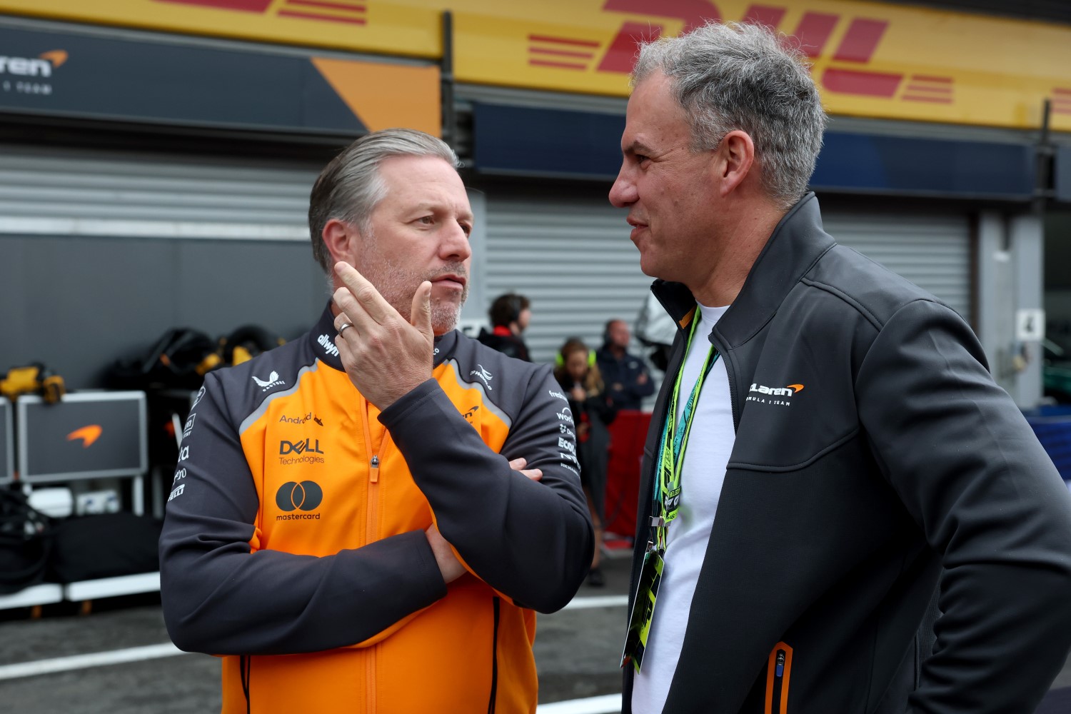 Zak Brown, Chief Executive Officer of McLaren and Chris Piastri talk in parc ferme during the F1 Grand Prix of Belgium at Circuit de Spa-Francorchamps on July 27, 2025 in Spa, Belgium. (Photo by Steven Tee/LAT Images for McLaren)