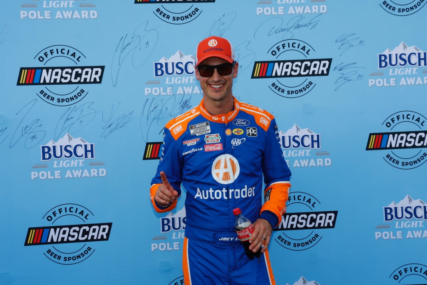 Joey Logano, driver of the #22 Autotrader Ford, poses for photos after winning the pole award during qualifying for the NASCAR Cup Series Quaker State 400 Available at Walmart at Echo Park Speedway on June 27, 2025 in Hampton, Georgia. (Photo by Sean Gardner/Getty Images)