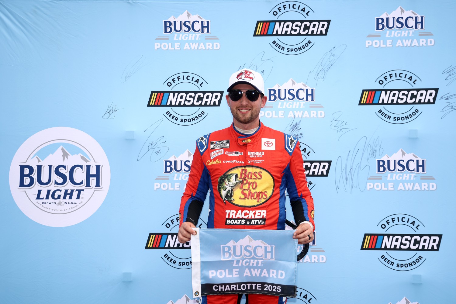 Chase Briscoe, driver of the #19 Bass Pro Shops Toyota, poses for photos after winning the pole award during qualifying for the NASCAR Cup Series Coca-Cola 600 at Charlotte Motor Speedway on May 24, 2025 in Concord, North Carolina. (Photo by Jared C. Tilton/Getty Images for NASCAR)