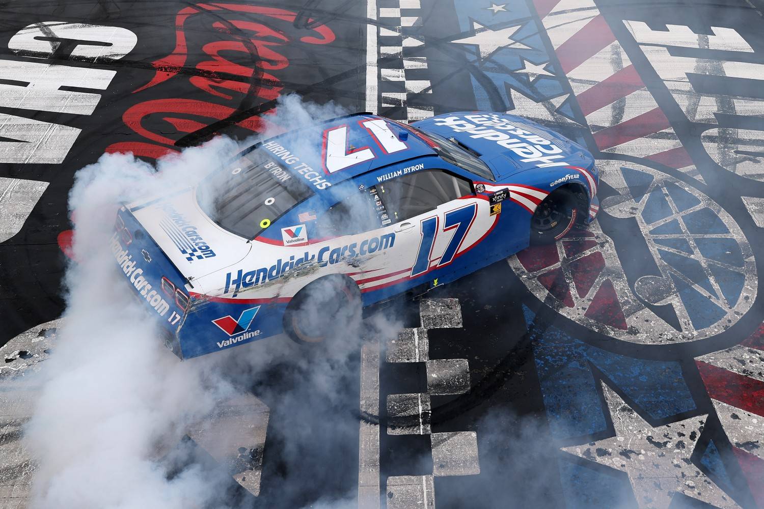 William Byron, driver of the #17 HendrickCars.com Chevrolet, celebrates with a burnout after winning the NASCAR Xfinity Series BetMGM 300 at Charlotte Motor Speedway on May 24, 2025 in Concord, North Carolina. (Photo by David Jensen/Getty Images for NASCAR)