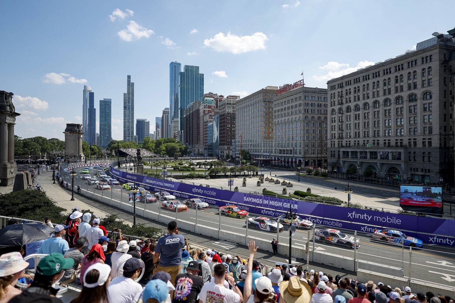 Shane Van Gisbergen, driver of the #9 WeatherTech/Red Bull Chevrolet, and Austin Hill, driver of the #21 Bennett Transportation Chevrolet, lead the field on a pace lap prior to the NASCAR Xfinity Series The Loop 110 at Chicago Street Course on July 05, 2025 in Chicago, Illinois. (Photo by Logan Riely/Getty Images)