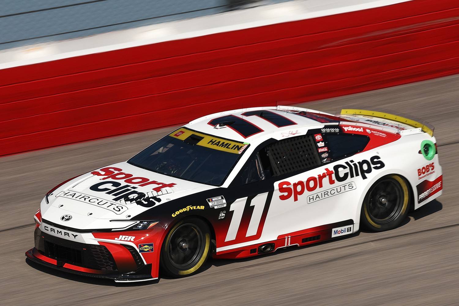 Denny Hamlin, driver of the #11 Sport Clips Haircuts Toyota, drives during practice for the NASCAR Cup Series Cook Out Southern 500 at Darlington Raceway on August 30, 2025 in Darlington, South Carolina. (Photo by Jared C. Tilton/Getty Images)