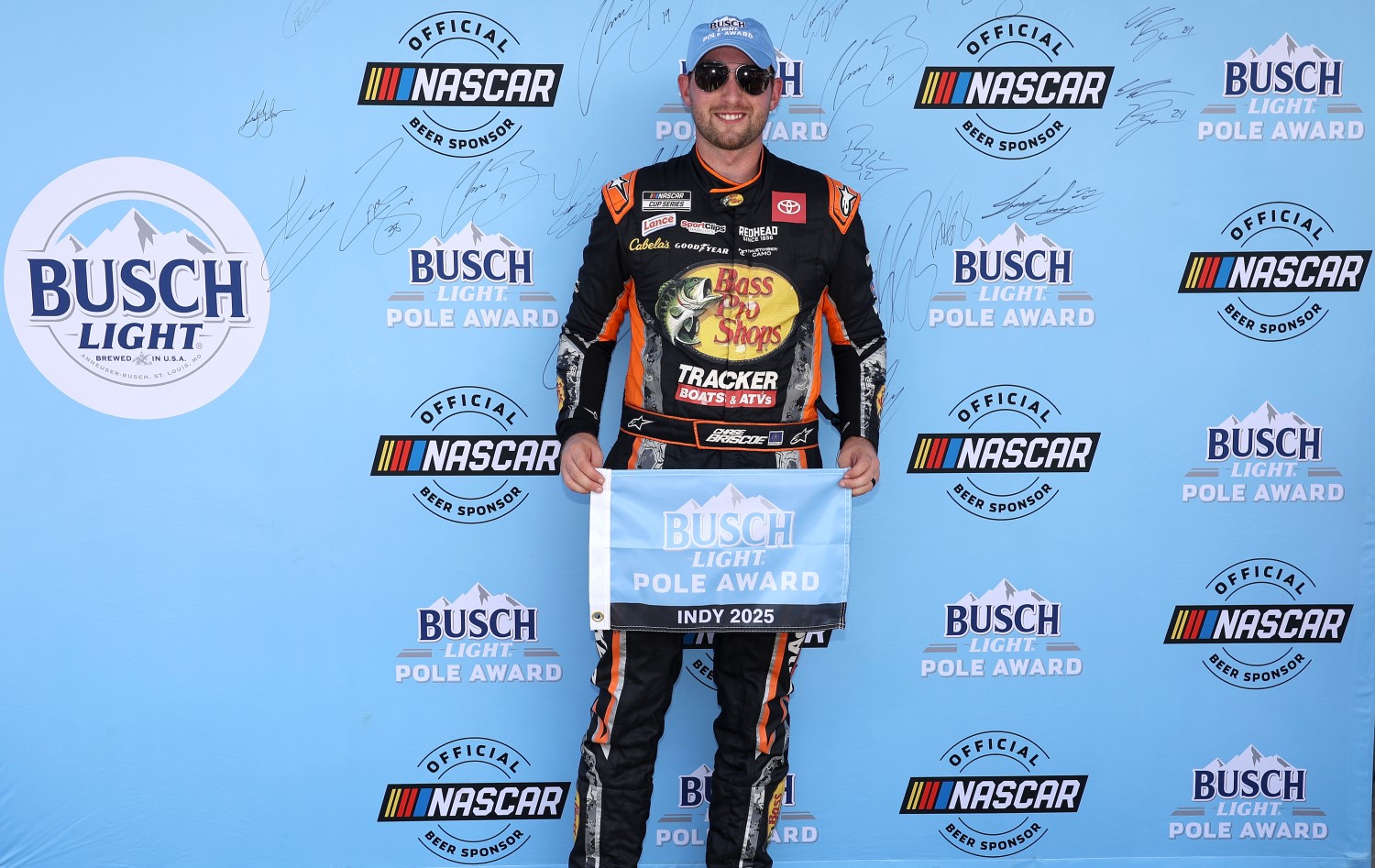 Chase Briscoe, driver of the #19 Bass Pro Shops Toyota, poses for photos after winning the pole award during qualifying for the NASCAR Cup Series Brickyard 400 Presented by PPG at Indianapolis Motor Speedway on July 26, 2025 in Indianapolis, Indiana. (Photo by James Gilbert/Getty Images)