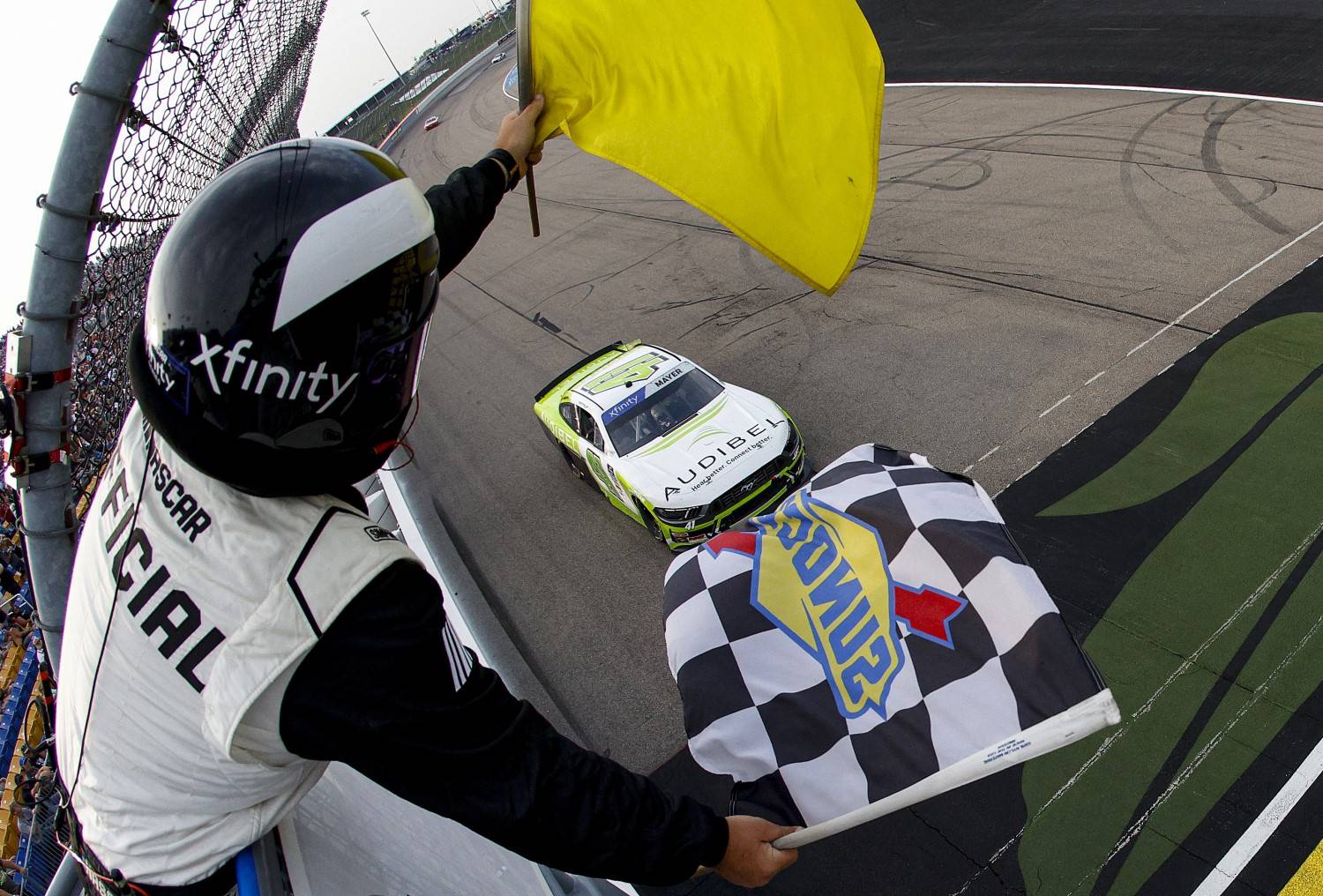 Sam Mayer, driver of the #41 Audibel Ford, takes the checkered flag under caution to win the NASCAR Xfinity Series HyVee Perks 250 at Iowa Speedway on August 02, 2025 in Newton, Iowa. (Photo by Sean Gardner/Getty Images)