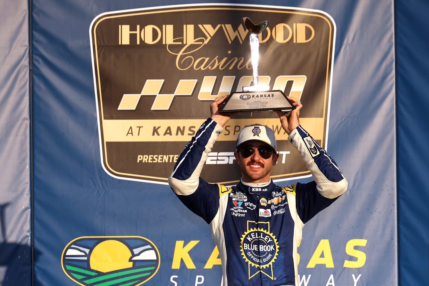 Chase Elliott, driver of the #9 Kelley Blue Book Chevrolet, celebrates in victory lane after winning the NASCAR Cup Series Hollywood Casino 400 Presented by ESPN BET at Kansas Speedway on September 28, 2025 in Kansas City, Kansas. (Photo by Chris Graythen/Getty Images for NASCAR)