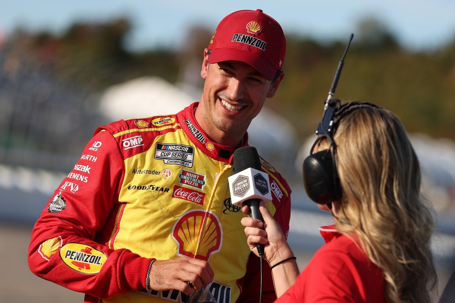 Joey Logano, driver of the #22 Shell Pennzoil Ford, speaks to the media after winning the pole during qualifying for the NASCAR Cup Series Mobil 1 301 at New Hampshire Motor Speedway on September 20, 2025 in Loudon, New Hampshire. (Photo by Meg Oliphant/Getty Images)