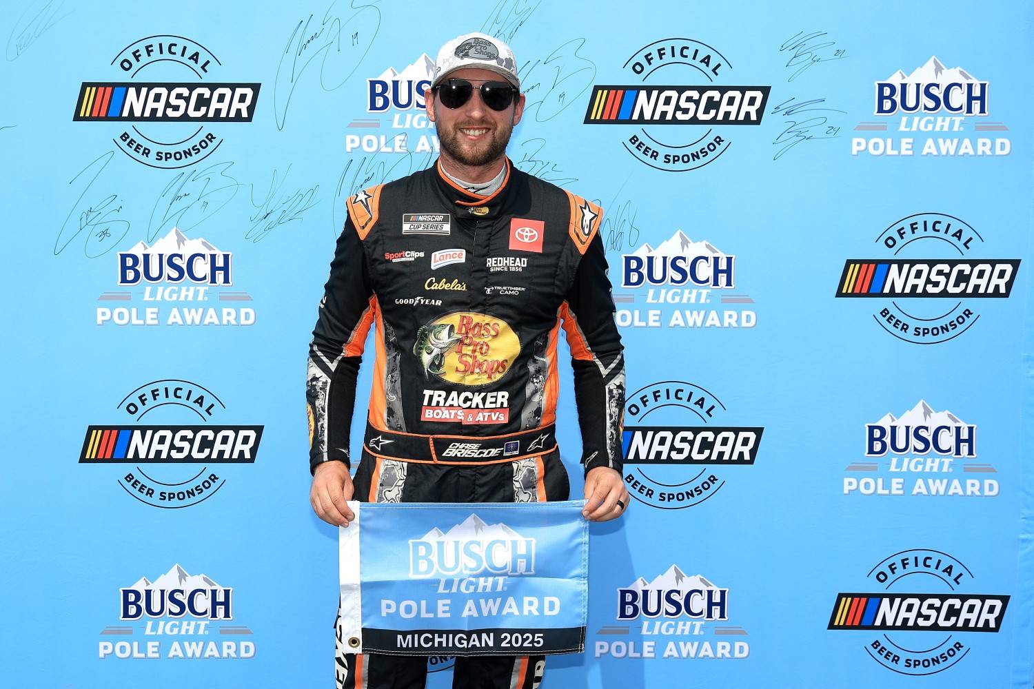 Chase Briscoe, driver of the #19 Bass Pro Shops Toyota, poses for photos after winning the pole award during qualifying for the NASCAR Cup Series FireKeepers Casino 400 at Michigan International Speedway on June 07, 2025 in Brooklyn, Michigan. (Photo by Chris Graythen/Getty Images)