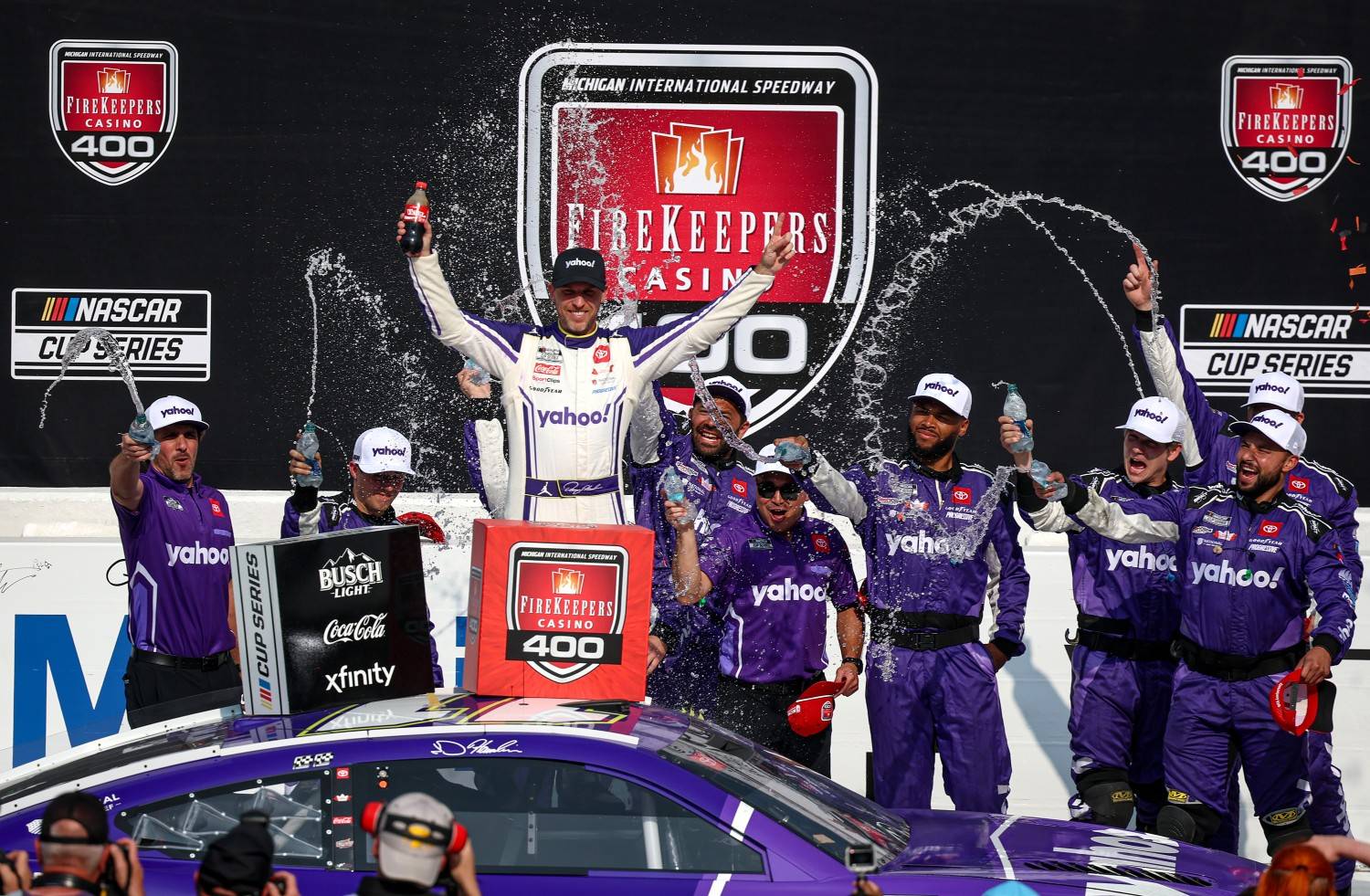 Denny Hamlin, driver of the #11 Yahoo! Toyota, celebrates in victory lane after winning the NASCAR Cup Series FireKeepers Casino 400 at Michigan International Speedway on June 08, 2025 in Brooklyn, Michigan. (Photo by Chris Graythen/Getty Images for NASCAR)