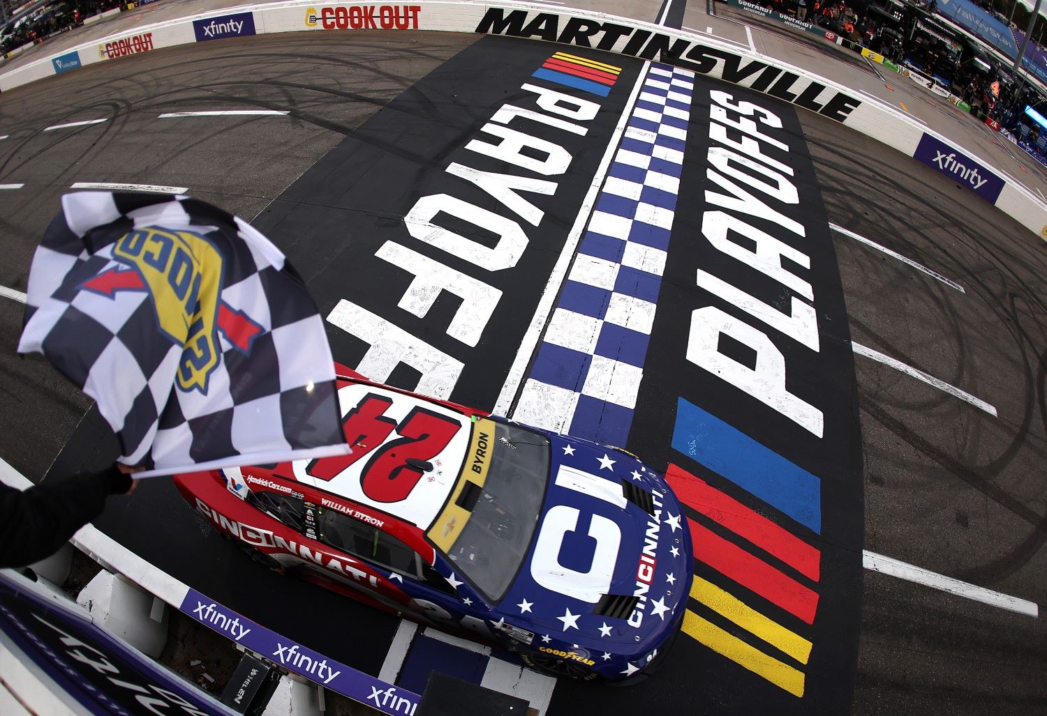 William Byron, driver of the #24 Cincinnati Chevrolet, takes the checkered flag to win the NASCAR Cup Series Xfinity 500 at Martinsville Speedway on October 26, 2025 in Martinsville, Virginia. (Photo by David Jensen/Getty Images)