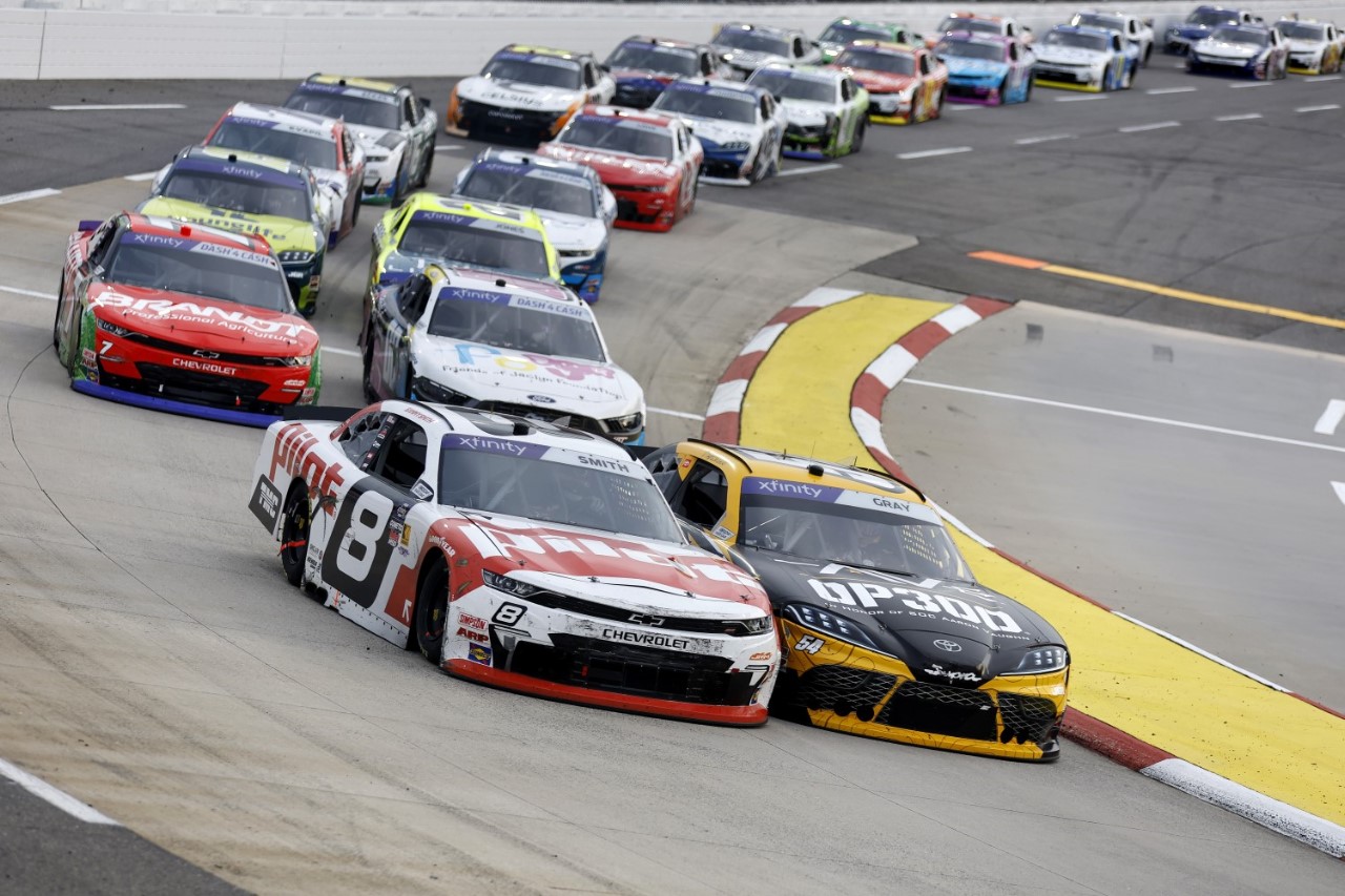 Sammy Smith, driver of the #8 Pilot Chevrolet, and Taylor Gray, driver of the #54 Operation 300 Toyota, during the NASCAR Xfinity Series US Marine Corps 250 at Martinsville Speedway on March 29, 2025 in Martinsville, Virginia. (Photo by Logan Riely/Getty Images for NASCAR)