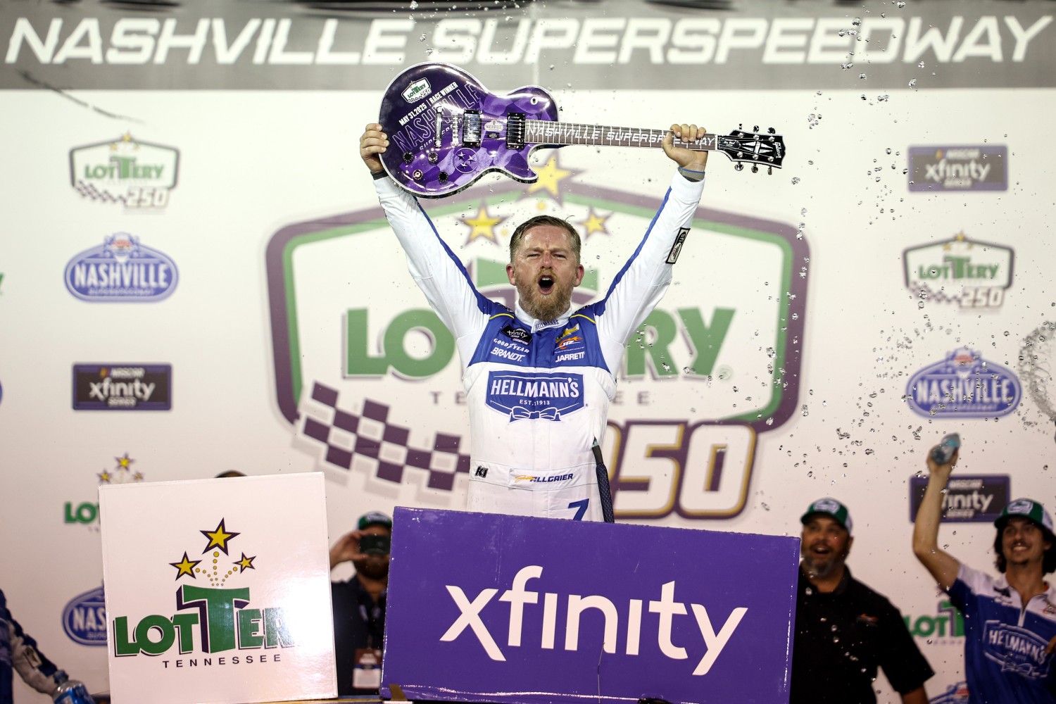 Justin Allgaier, driver of the #7 Hellmann's Chevrolet, celebrates in victory lane after winning the NASCAR Xfinity Series Tennessee Lottery 250 at Nashville Superspeedway on May 31, 2025 in Lebanon, Tennessee. (Photo by James Gilbert/Getty Images)