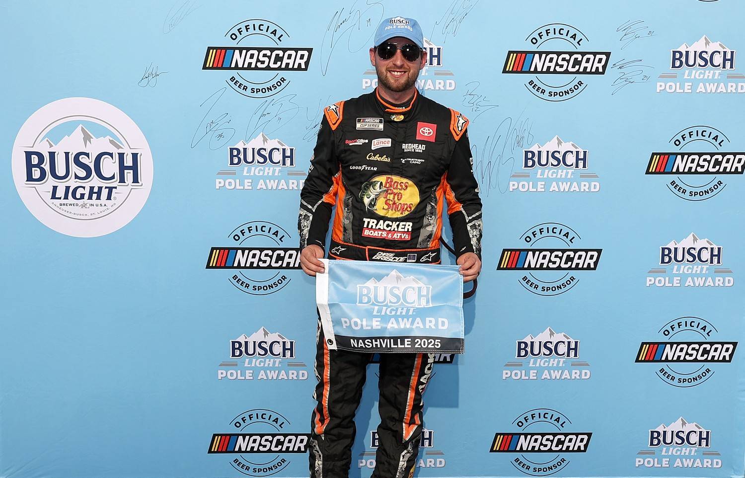 Chase Briscoe, driver of the #19 Bass Pro Shops Toyota, poses for photos after winning the pole award during qualifying for the NASCAR Cup Series Cracker Barrel 400 at Nashville Superspeedway on May 31, 2025 in Lebanon, Tennessee. (Photo by James Gilbert/Getty Images)