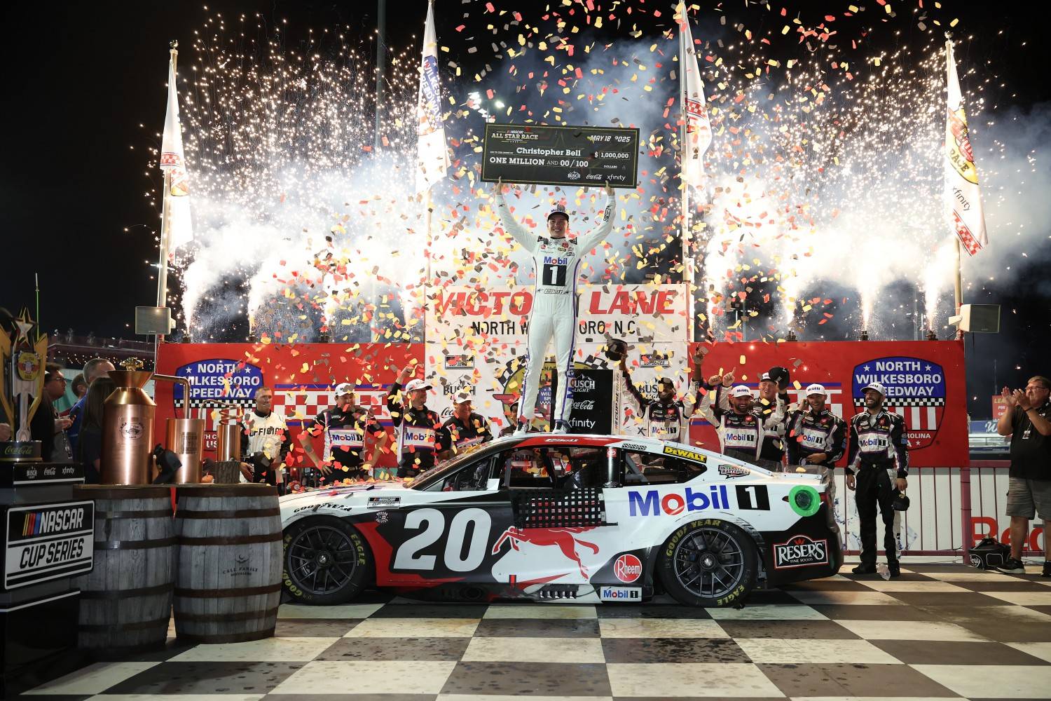 Christopher Bell, driver of the #20 Mobil 1 Toyota, celebrates in Victory Lane after winning the NASCAR Cup Series All-Star Race at North Wilkesboro Speedway on May 18, 2025 in North Wilkesboro, North Carolina. (Photo by James Gilbert/Getty Images)