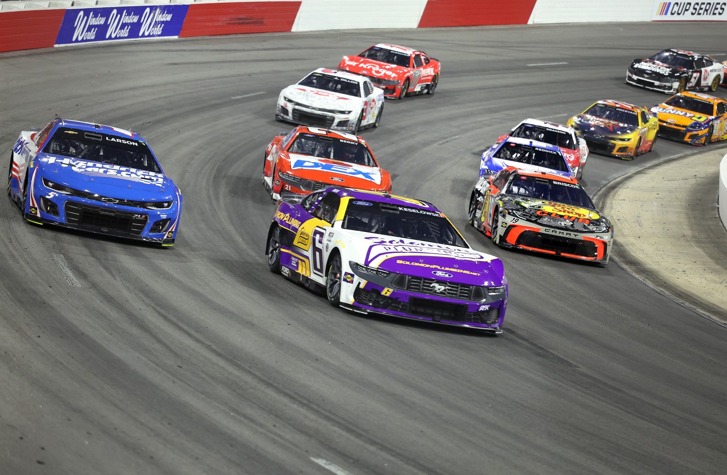 Brad Keselowski, driver of the #6 Solomon Plumbing Ford, Kyle Larson, driver of the #5 HendrickCars.com Chevrolet, and Chase Briscoe, driver of the #19 Bass Pro Shops Toyota, race during the NASCAR Cup Series All-Star Race at North Wilkesboro Speedway on May 18, 2025 in North Wilkesboro, North Carolina. (Photo by David Jensen/Getty Images)