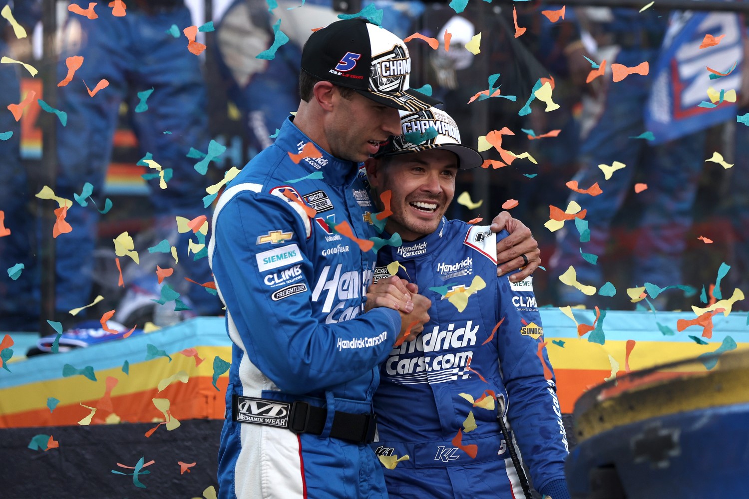 Crew chief Cliff Daniels (L) Kyle Larson, driver of the #5 HendrickCars.com Chevrolet, celebrate in victory lane after finish first of the NASCAR Cup Series Championship 4 drivers to win the NASCAR Cup Series Championship at Phoenix Raceway on November 02, 2025 in Avondale, Arizona. (Photo by Meg Oliphant/Getty Images for NASCAR)