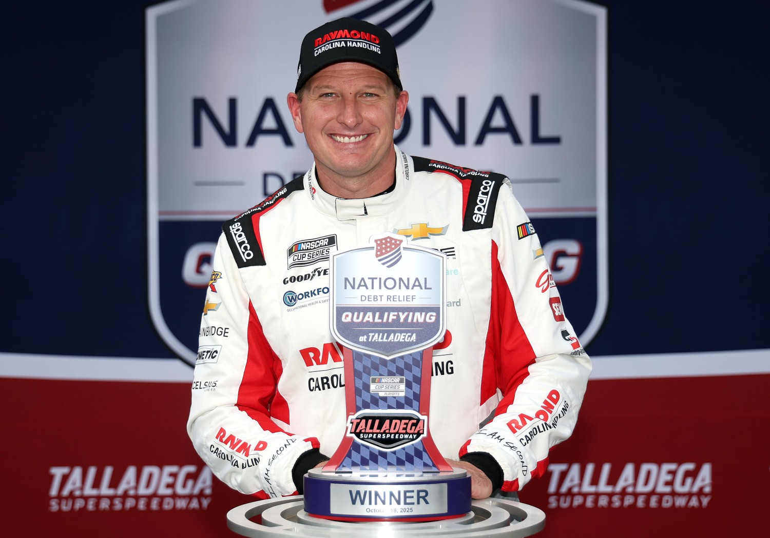 Michael McDowell, driver of the #71 Carolina Handling Chevrolet, poses for photos after winning the pole award during qualifying for the NASCAR Cup Series YellaWood 500 at Talladega Superspeedway on October 18, 2025 in Talladega, Alabama. (Photo by Chris Graythen/Getty Images for NASCAR)