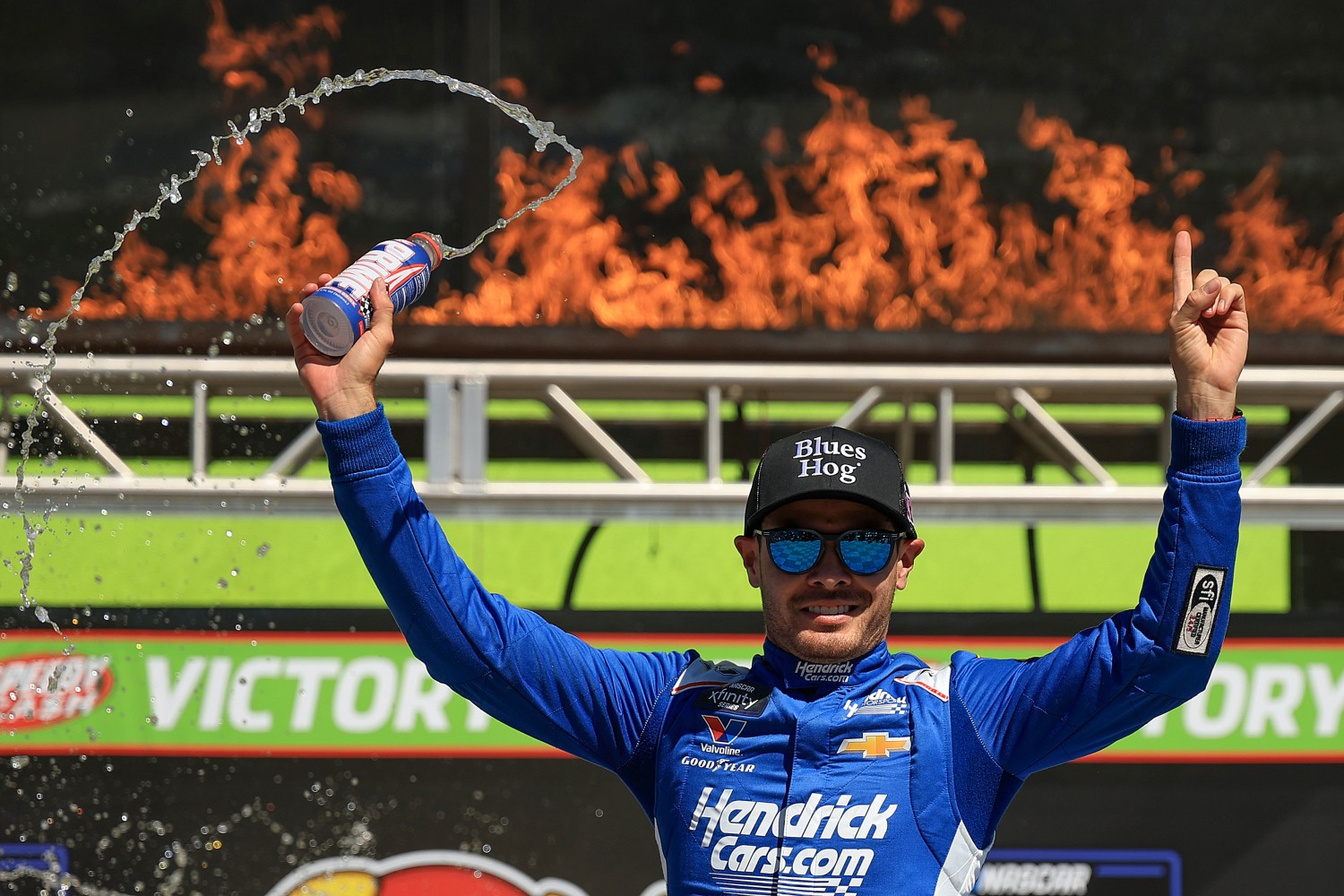 Kyle Larson, driver of the #88 Blues Hog Chevrolet, celebrates in victory lane after winning the NASCAR Xfinity Series Andy's Frozen Custard 300 at Texas Motor Speedway on May 03, 2025 in Fort Worth, Texas. (Photo by Chris Graythen/Getty Images)