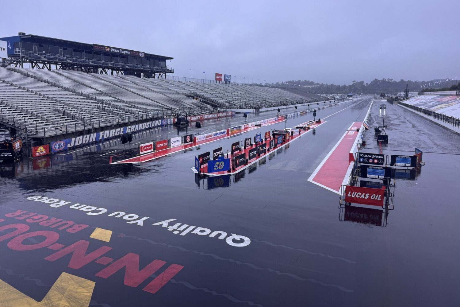 A very wet Pomona so far. Image courtesy of NHRA