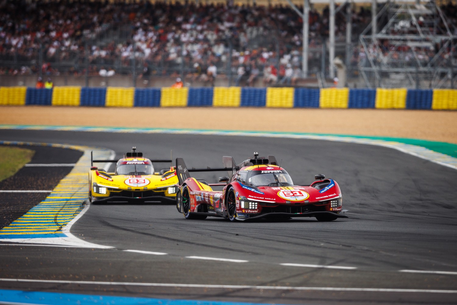51 Ferrari leads the #83 Ferrari