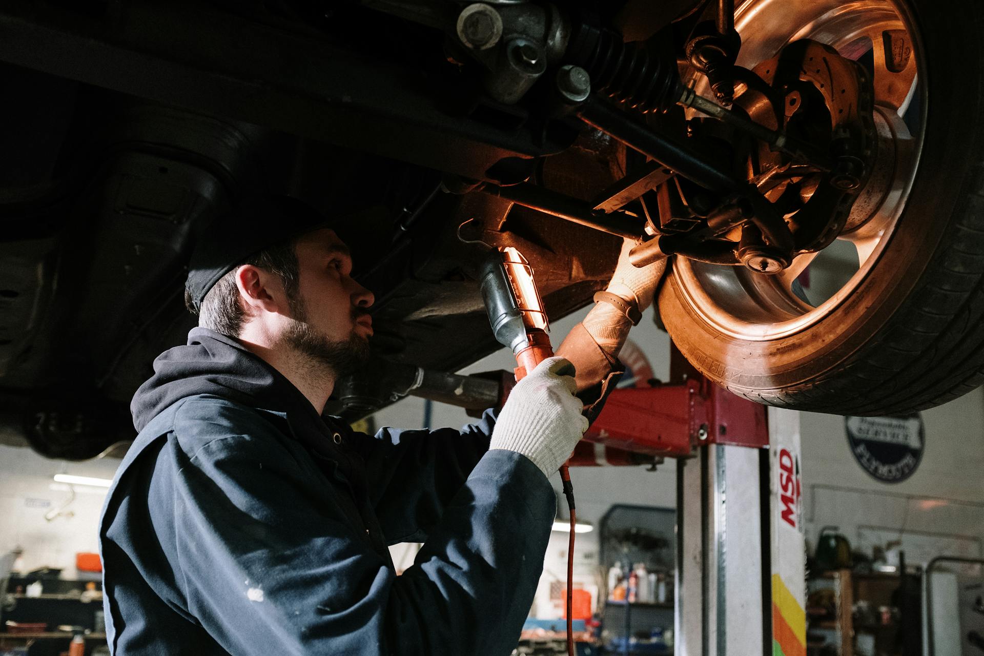 Mechanic Working on Car on Pexels by Cottonbro Studio