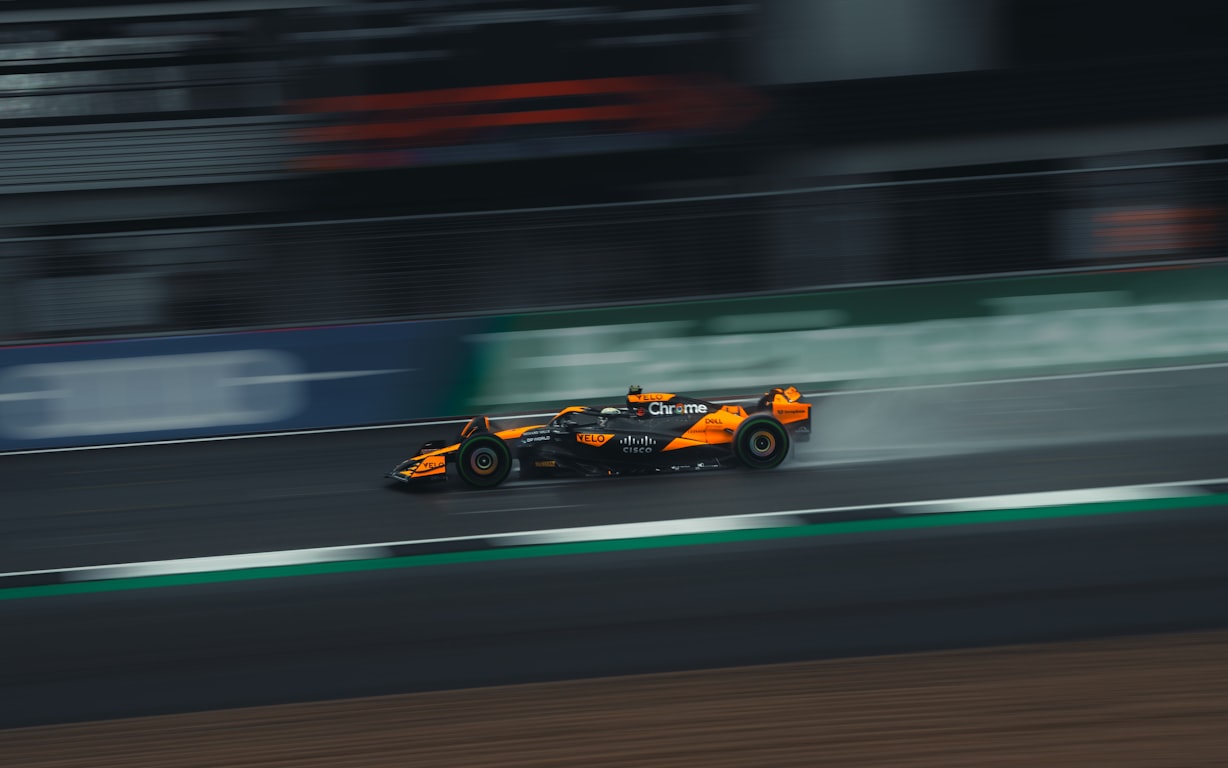Photo of McLaren F1 car in the rain from unsplash